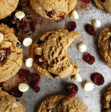 gluten-free-dairy-free-white-chocolate-craisin-cookies-on-a-baking-sheet-above