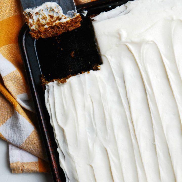 gluten-free-vegan-carrot-sheet-cake-shot-from-above-with-one-piece-missing