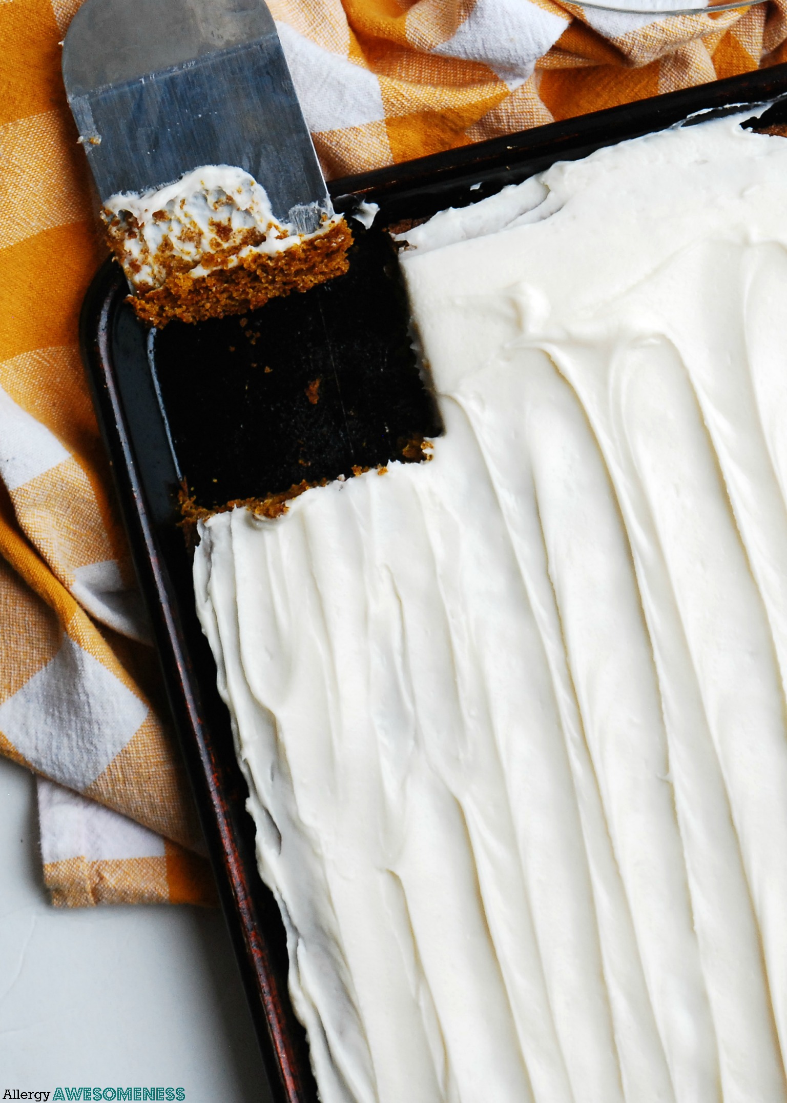 gluten-free-vegan-carrot-sheet-cake-shot-from-above-with-one-piece-missing