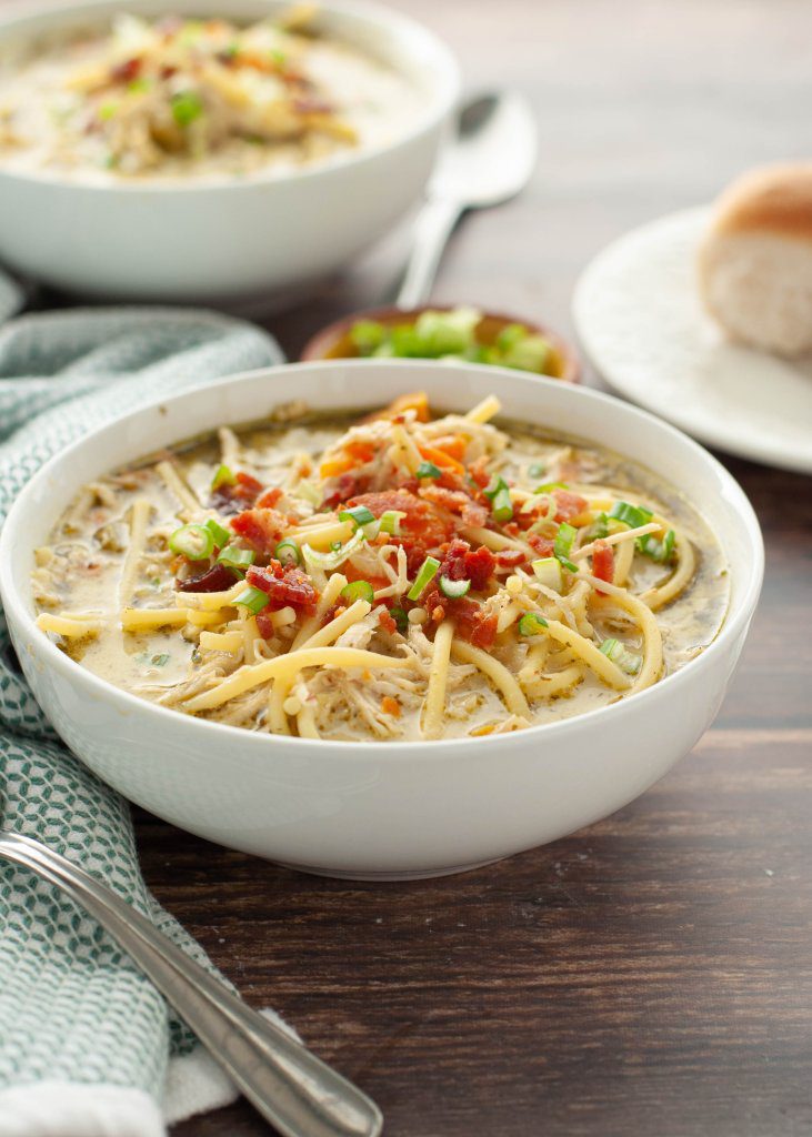 a close up shot of crack-chicken-noodle-soup-recipe-that's-gluten-and-dairy-free-in-a-white-bowl