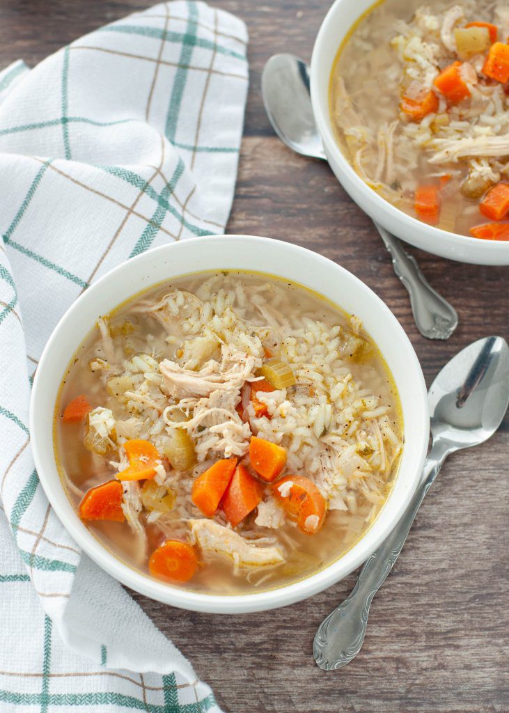 how-to-make-chicken-and-rice-soup-gluten-free-two-bowls-shown-from-above