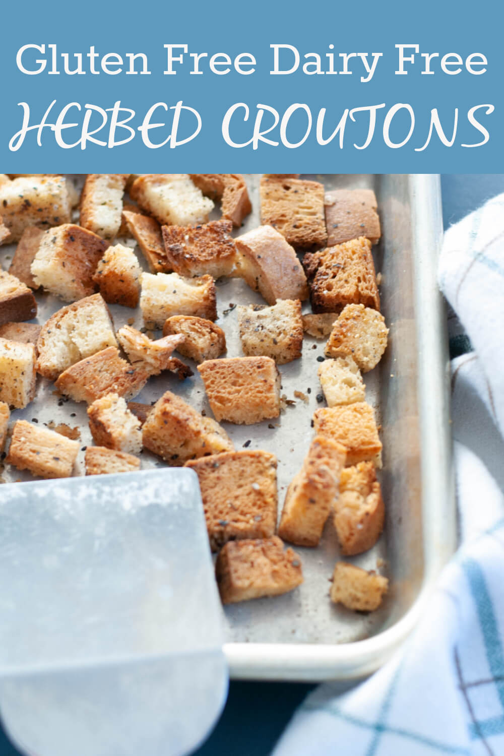 Gluten-free, dairy-free, and herbed croutons in a large wooden bowl, garnished with fresh basil.