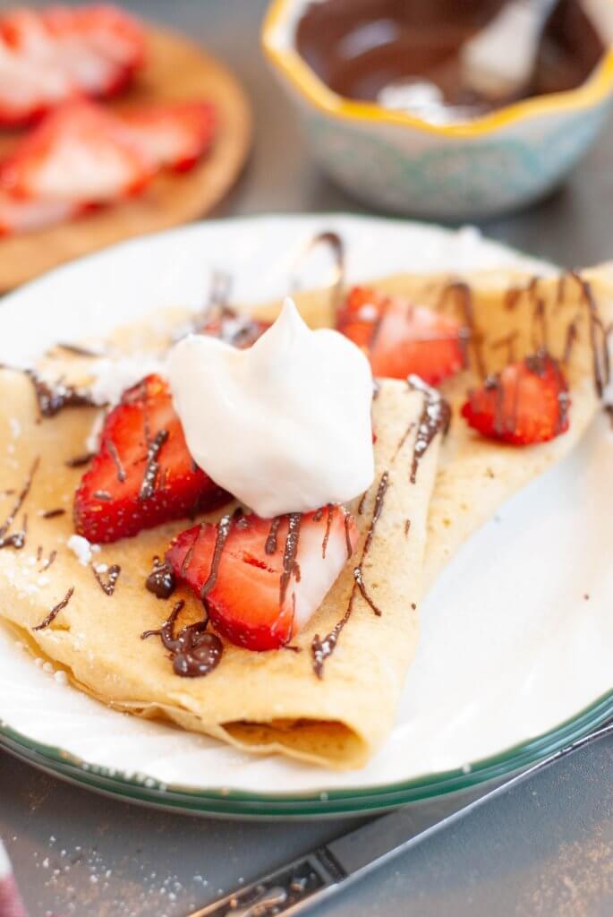 gluten-free-dairy-free-crepes-with-strawberries-chocolate-and-whipped-cream