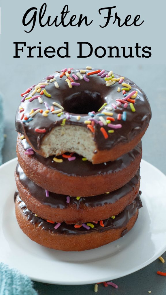 stacked-donuts-with-a-bite-taken-out-pinterest-image
