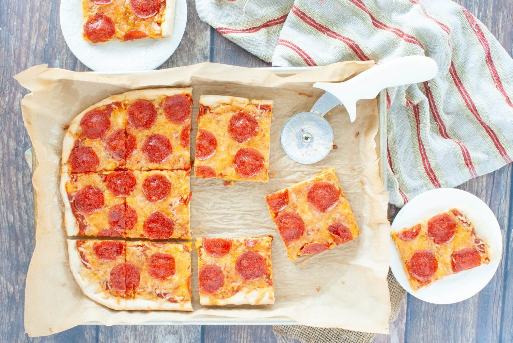 gluten-free-pizza-from-above-with-slices-missing-in-rectangle-shape