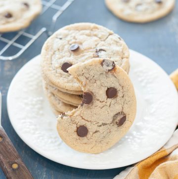 gluten-free-dairy-free-chocolate-chip-cookies-stacked-with-one-bite-taken