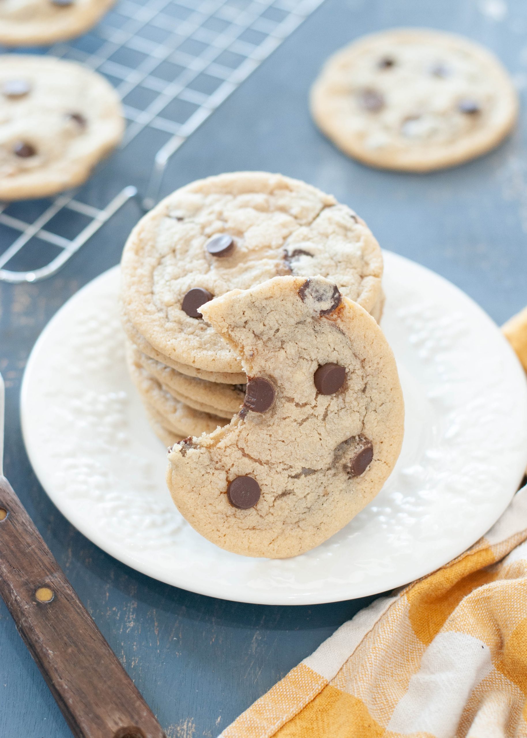 gluten-free-dairy-free-chocolate-chip-cookies-stacked-with-one-bite-taken