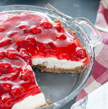 no bake cherry cheesecake with slice taken out