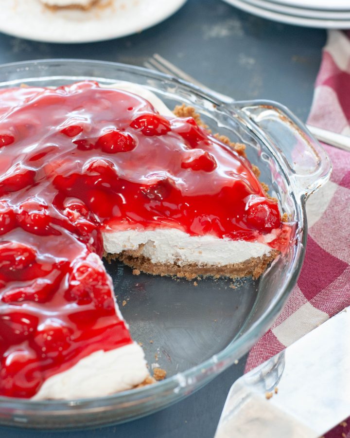 no bake cherry cheesecake with slice taken out