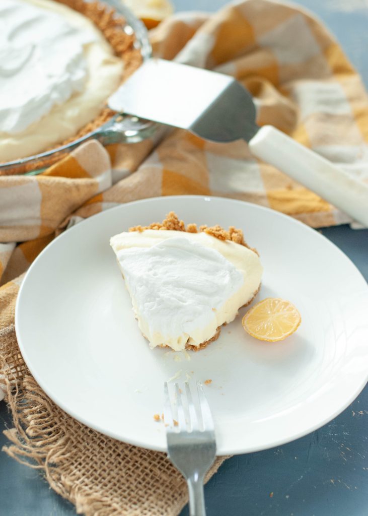 gluten-free-dairy-free-lemon-cream-pie-slice-with-bite-taken-out