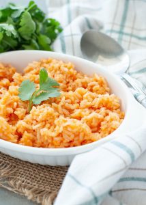 gluten-free-mexican-rice-in-a-white-dish-with-a-cilantro-garnish