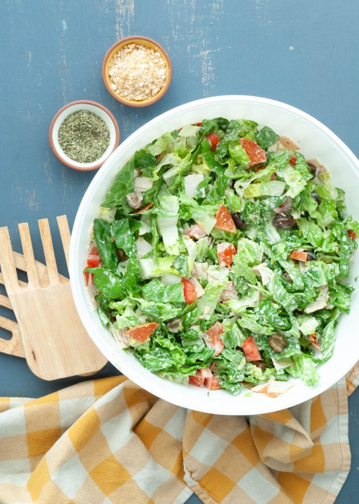 dairy-free-gluten-free-italian-chopped-salad-in-a-large-serving-bowl-shot-from-above
