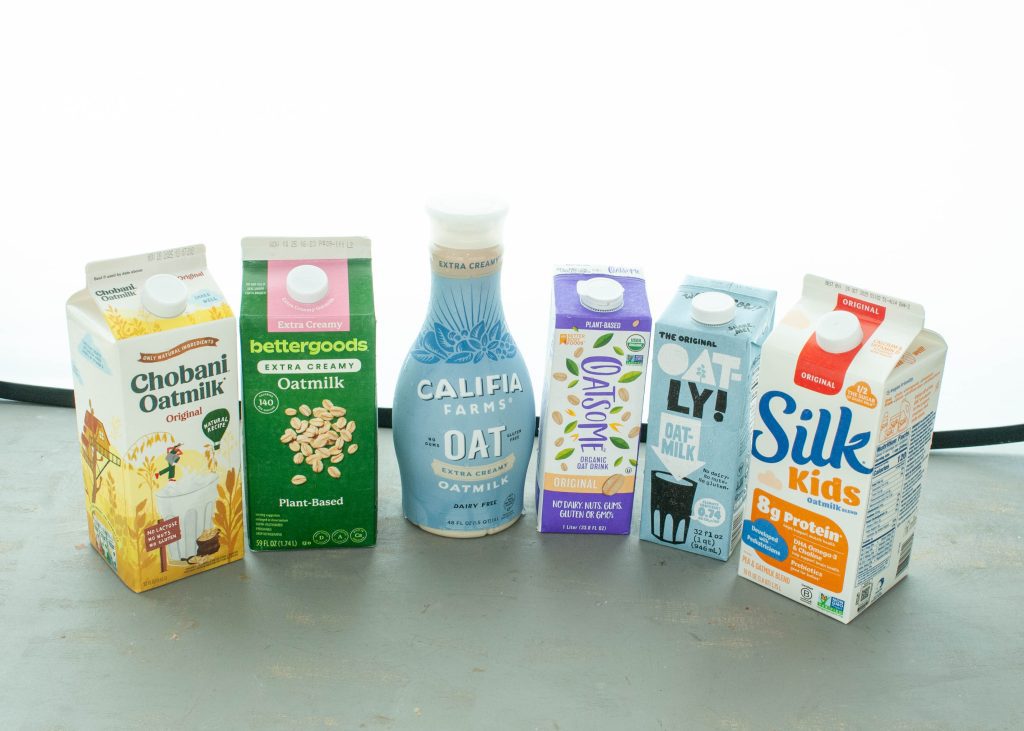 which oat milks are gluten free photo of various brands all lined up together