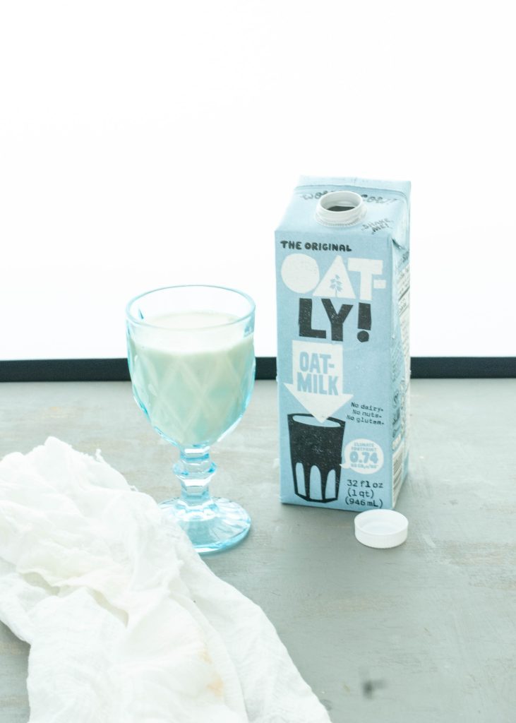 are oat milks safe for Celiacs photo of oatly in a glass